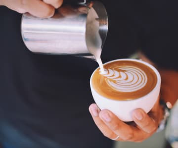 Barista making latte art